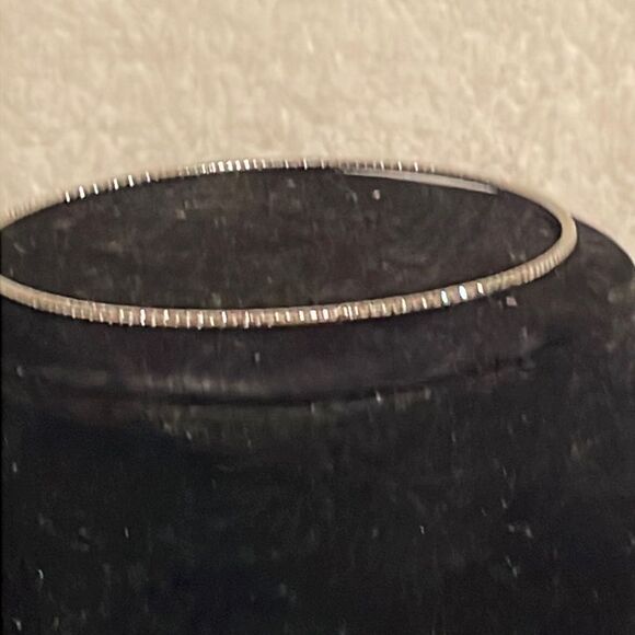 7.5” stackable polished silver tone bangle bracelet w/32 prong set crystals - Picture 1 of 12